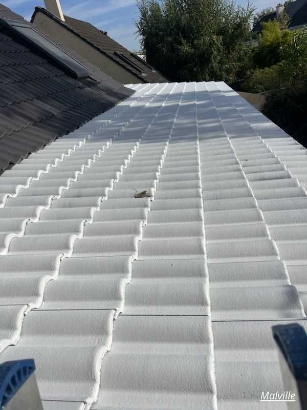 Cool roofing d'un toit à Malville par TC Habitat